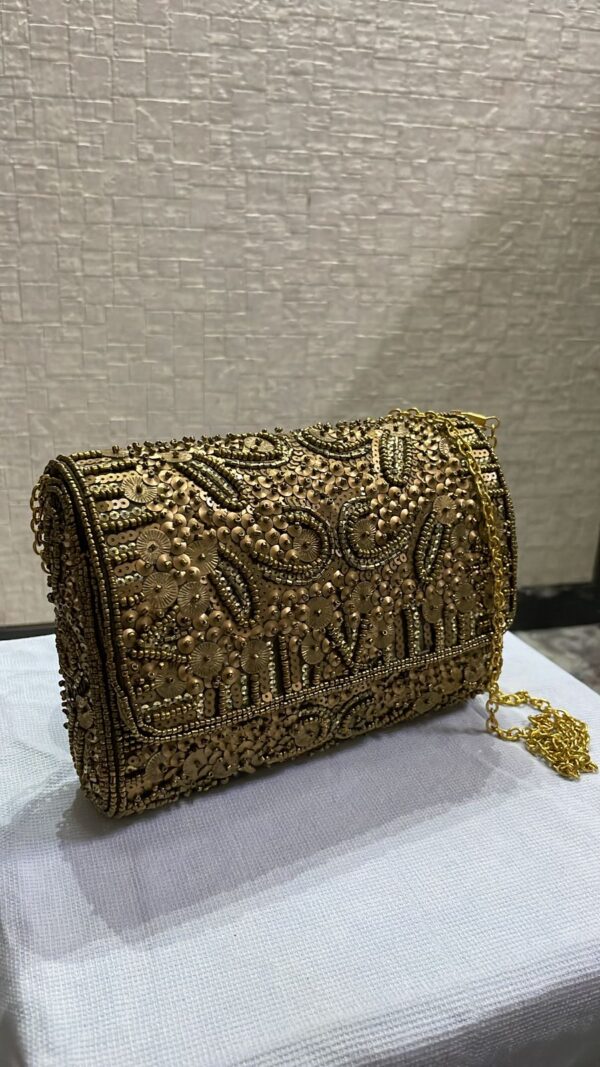 Bronze flower sling bag
