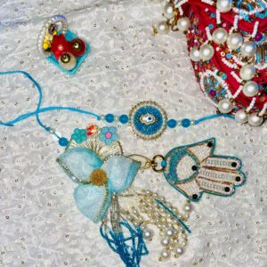 Bhaiya Bhabhi Blue Flower Assorted Rakhi Set (Male Rakhi, Female Rakhi, Roli & Rice Basket)